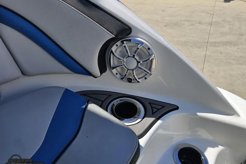 Slide: The Image of 2017 Yamaha Boats 242X E-Series interior with speaker and cup holder detail. - 42
