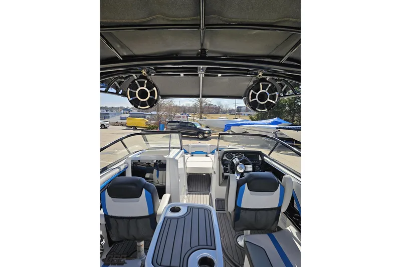 Slide: The Image of 2017 Yamaha Boats 242X E-Series interior with modern seating and audio system. - 46