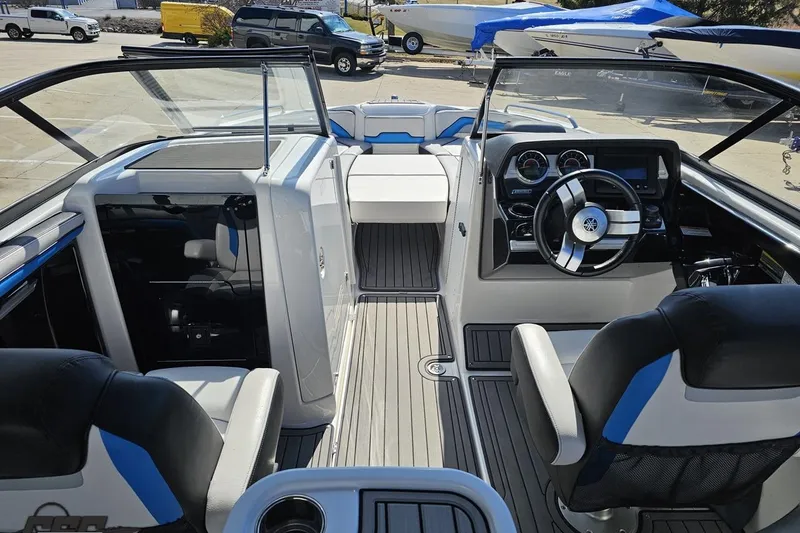 Slide: The Image of 2017 Yamaha Boats 242X E-Series interior with modern dashboard and seating. - 53