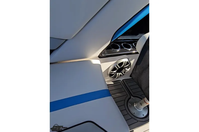 Slide: The Image of Interior of 2017 Yamaha Boats 242X E-Series, featuring seating and speaker system. - 59