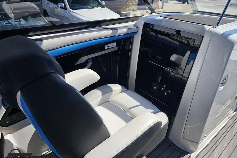 Slide: The Image of Interior of 2017 Yamaha Boats 242X E-Series, featuring sleek seating and modern design elements. - 60