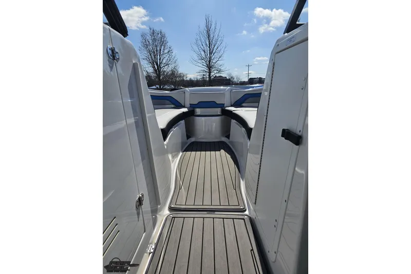 Slide: The Image of 2017 Yamaha Boats 242X E-Series interior with sleek seating and modern design. - 86