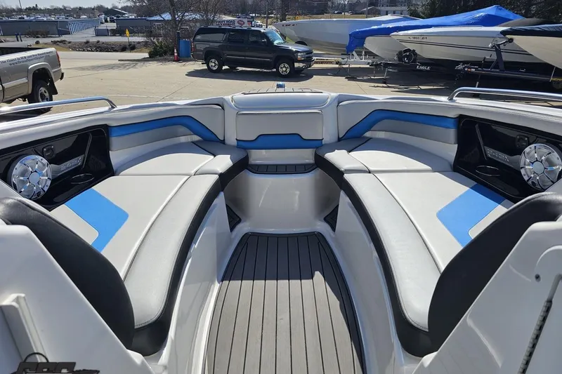 Slide: The Image of 2017 Yamaha Boats 242X E-Series interior with sleek seating and modern design. - 87