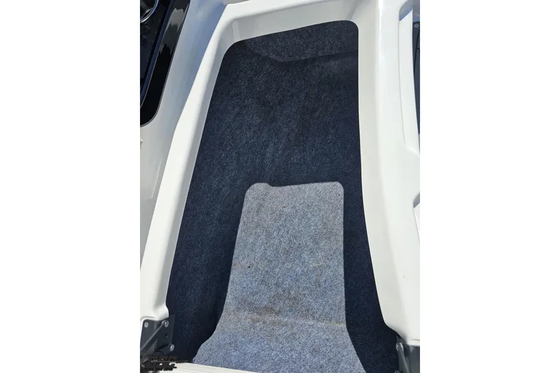 Slide: The Image of Interior carpet of 2017 Yamaha Boats 242X E-Series, showcasing clean design. - 95