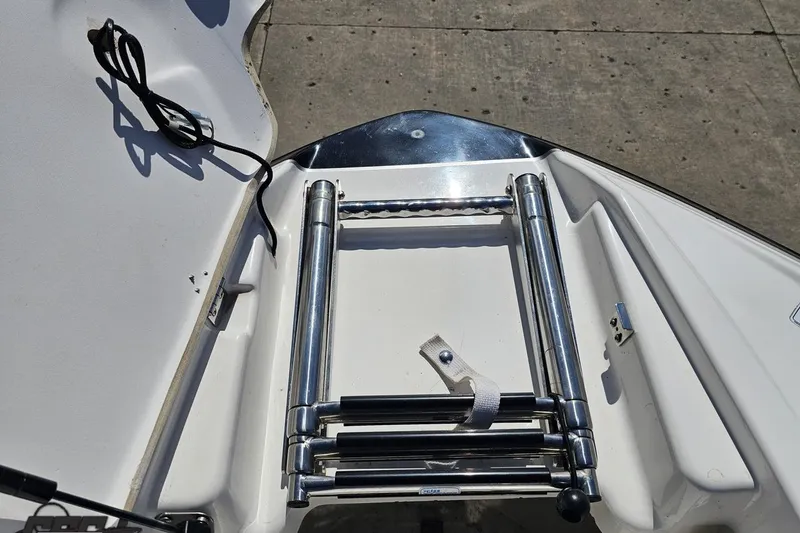 Slide: The Image of Yamaha Boats 2017 242X E-Series swim ladder on deck, folded and secured. - 97