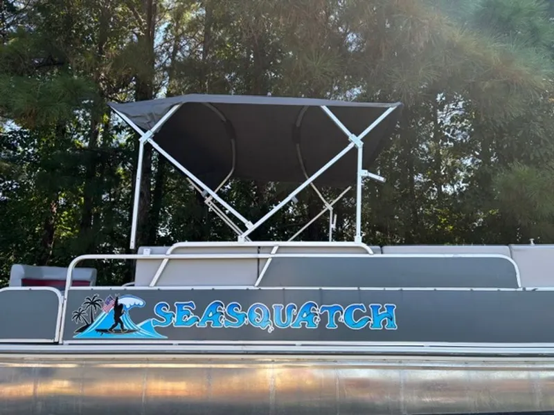 Slide: The Image of 2011 G3 SunCatcher boat with "Seasquatch" lettering. - 11