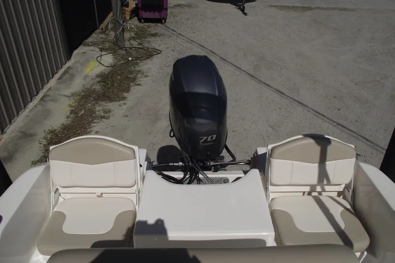 Slide: The Image of 2017 Robalo R160 Center Console boat with Yamaha 70 engine, rear seating view. - 19