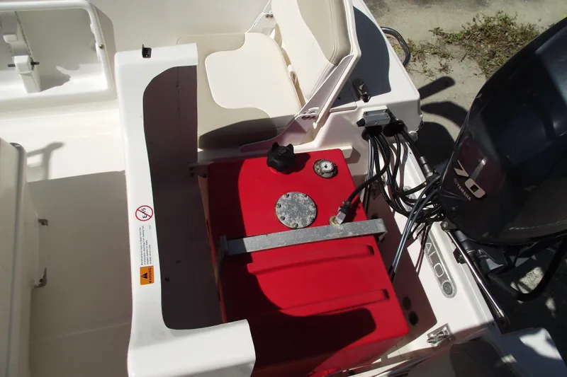 Slide: The Image of 2017 Robalo R160 Center Console boat with red fuel tank and Yamaha engine. - 22