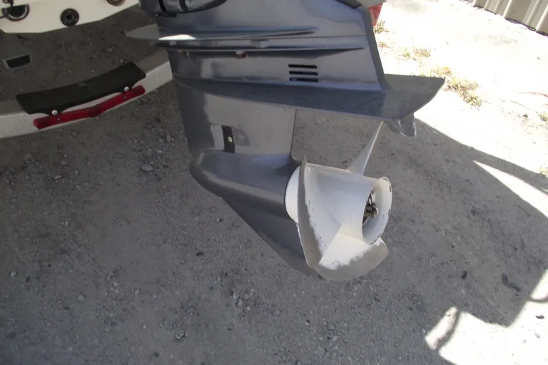 Slide: The Image of 2017 Robalo R160 Center Console boat propeller on dry ground. - 5