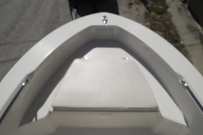 Slide: The Image of 2017 Robalo R160 Center Console boat bow with seating area. - 6