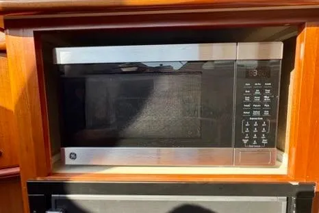 Slide: The Image of Built-in microwave in 2008 Silverton 36 Convertible yacht kitchen. - 24