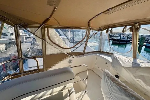 Slide: The Image of 2008 Silverton 36 Convertible yacht interior with marina view. - 6