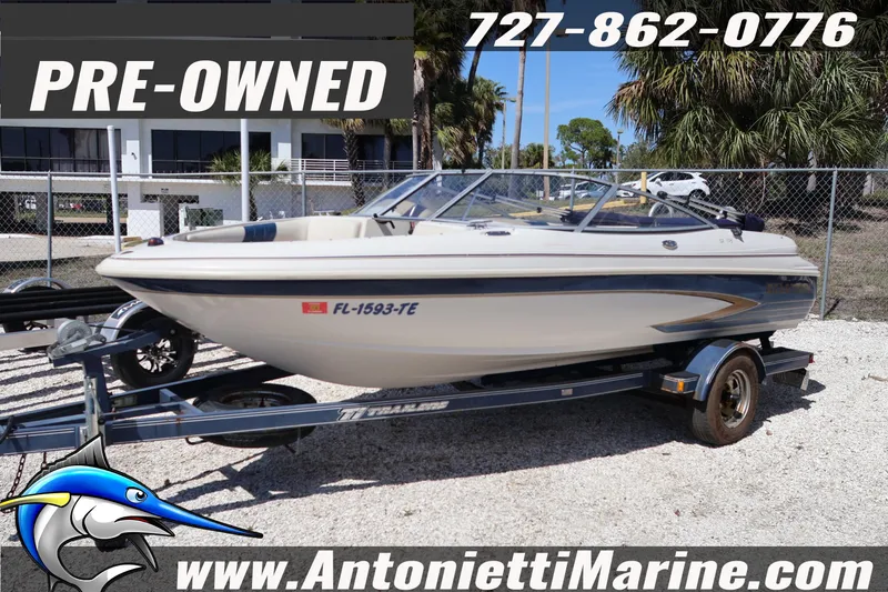 The Image of Pre-owned 1997 Glastron boat on trailer at Antonietti Marine dealership. - 1