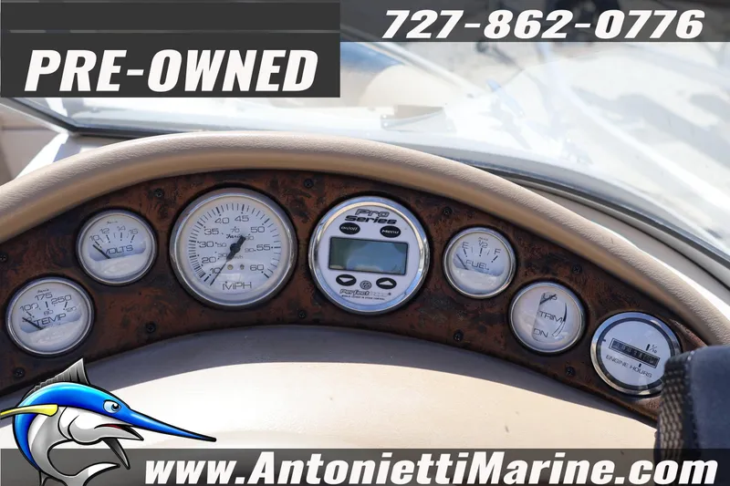 Slide: The Image of 1997 Glastron boat dashboard with gauges, pre-owned, contact Antonietti Marine. - 14