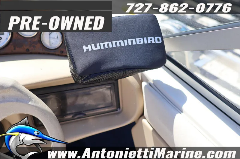 Slide: The Image of Pre-owned 1997 Glastron boat dashboard with Humminbird device, contact Antonietti Marine. - 15