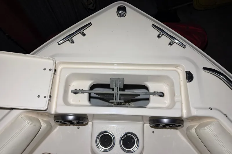 Slide: The Image of 2020 Grady White Freedom 192 boat anchor compartment with speakers and seating. - 15