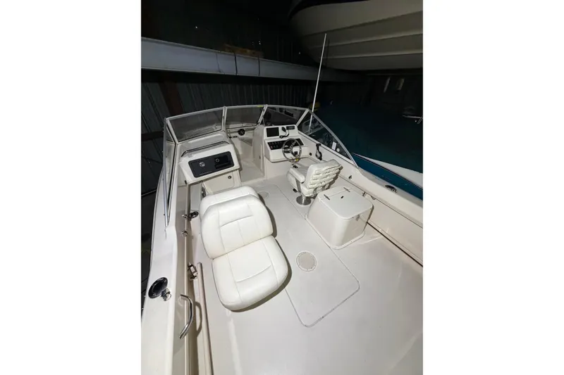 Slide: The Image of 2020 Grady White Freedom 192 boat interior with seating and controls. - 20