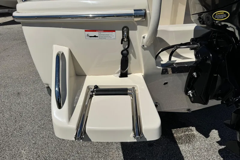 Slide: The Image of 2018 Scout 195 Sportfish boat with swim platform and ladder. - 9