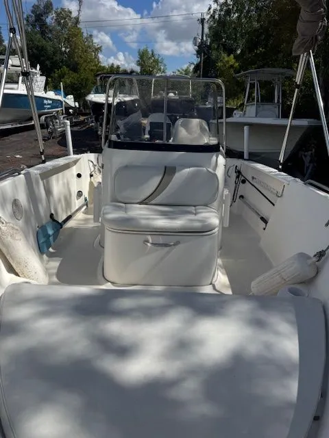 Slide: The Image of Interior view of a 2003 Wellcraft Tournament boat under sunny skies. - 2