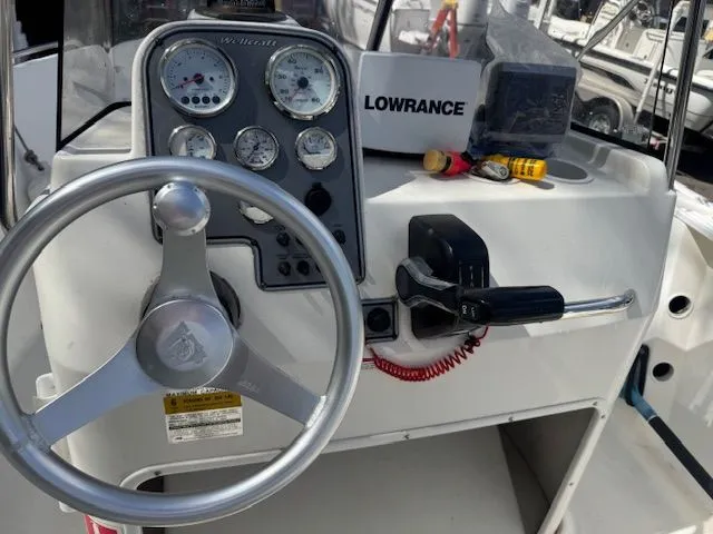 Slide: The Image of Console of a 2003 Wellcraft Tournament boat with Lowrance device. - 3