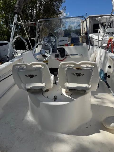 Slide: The Image of Interior view of a 2003 Wellcraft Tournament boat with steering console. - 5