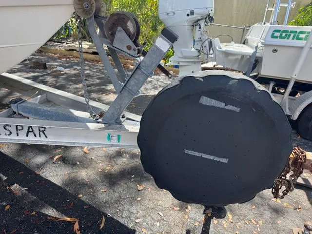 Slide: The Image of 2003 Wellcraft Tournament boat trailer with spare tire. - 7