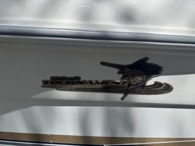 Slide: The Image of Logo of 2003 Wellcraft Tournament boat on white background. - 8