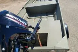 Slide: The Image of 2025 Tracker Grizzly 1436 Utility boat with Mercury outboard motor on a trailer. - 5