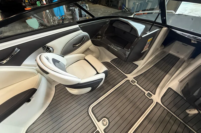 Slide: The Image of 2016 Monterey 224FS boat interior with sleek seating and modern design. - 11