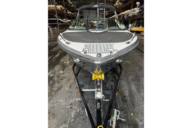 Slide: The Image of 2016 Monterey 224FS boat on trailer in storage facility. - 2