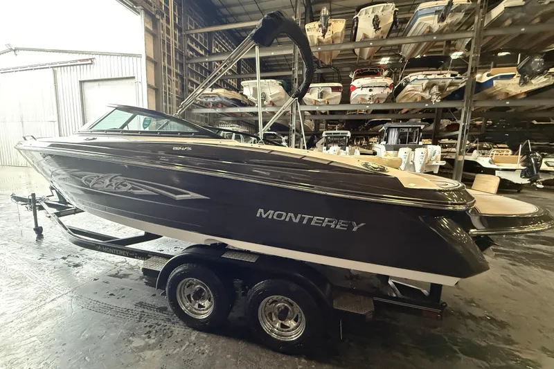 Slide: The Image of 2016 Monterey 224FS boat on trailer in indoor storage facility. - 5