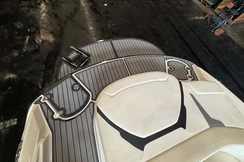 Slide: The Image of 2016 Monterey 224FS boat interior with sleek, modern design and comfortable seating. - 7