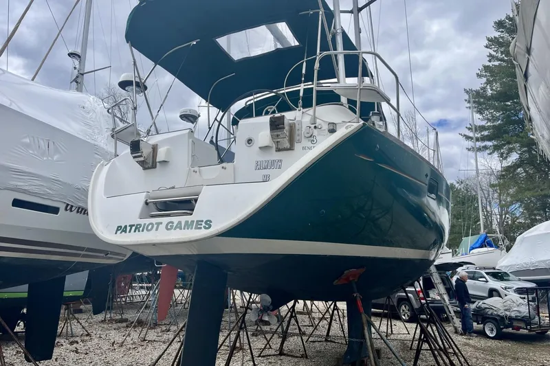 Slide: The Image of 1999 Beneteau Oceanis 381 sailboat named "Patriot Games" on dry dock. - 18