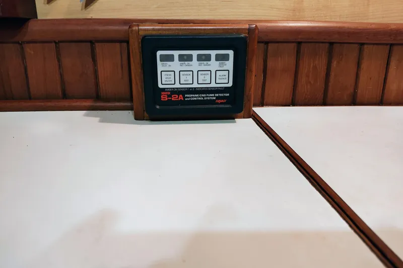 Slide: The Image of Control panel of a 1986 CHB Senator boat with propane fume detector system. - 34