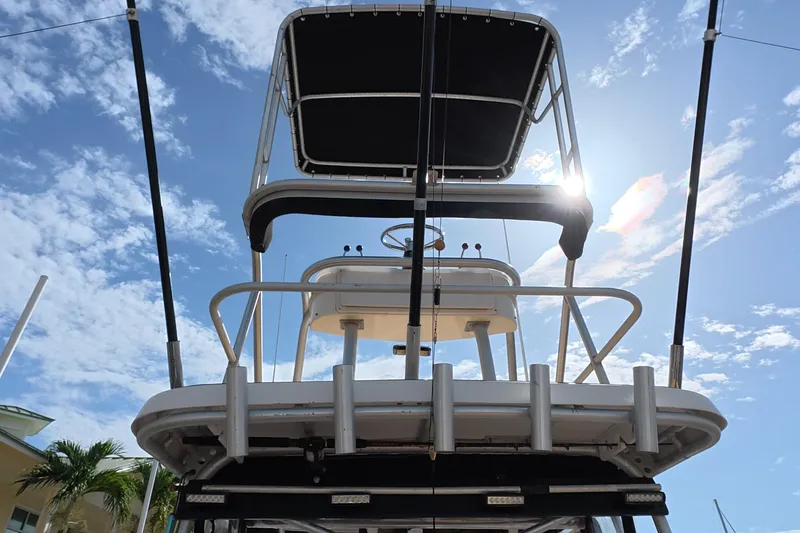 Slide: The Image of 1992 Luhrs 300 Tournament boat with tower against a sunny sky. - 23
