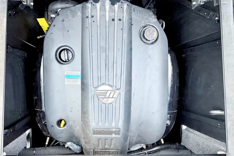 Slide: The Image of 2023 Malibu Wakesetter 23 MXZ engine compartment showcasing Monsoon engine. - 23