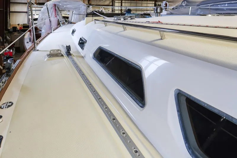 Slide: The Image of 2007 Sabre 386 yacht deck with sleek design and modern fittings. - 12