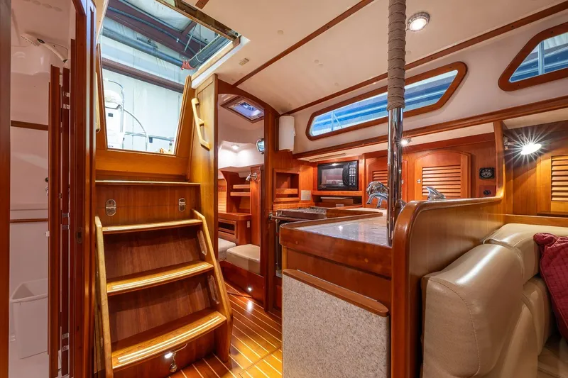 Slide: The Image of Luxurious interior of 2007 Sabre 386 yacht with wooden finishes and modern amenities. - 15