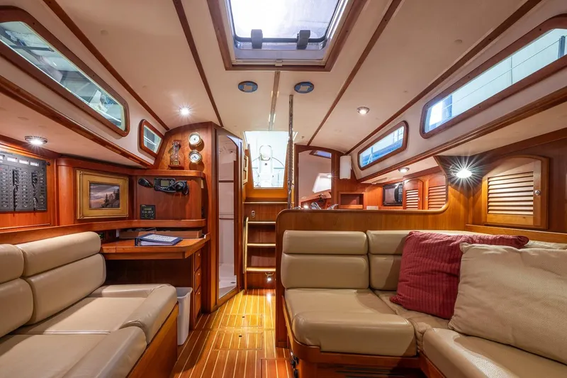 Slide: The Image of Luxurious interior of 2007 Sabre 386 yacht with plush seating and elegant wood finishes. - 36