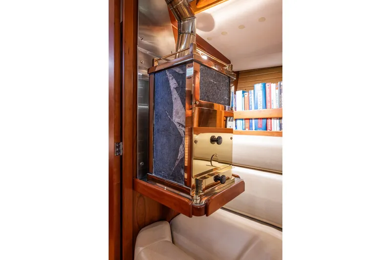 Slide: The Image of Luxurious interior of 2007 Sabre 386 yacht featuring elegant wood and metal accents. - 37