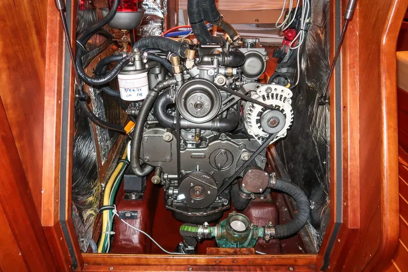 Slide: The Image of Engine compartment of a 2007 Sabre 386 sailboat, showcasing detailed mechanical components. - 39