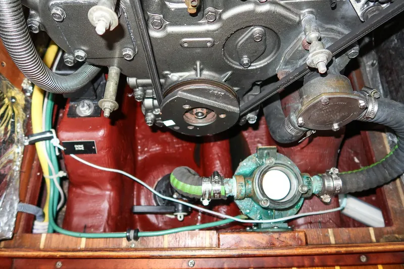 Slide: The Image of Engine compartment of a 2007 Sabre 386 sailboat, showing mechanical components and hoses. - 40