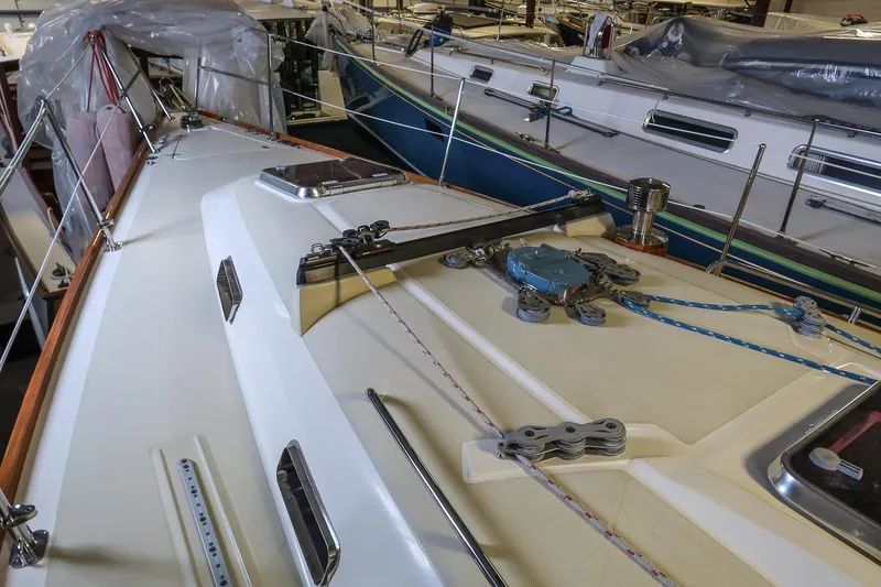 Slide: The Image of 2007 Sabre 386 sailboat deck with rigging and hardware in a marina. - 5