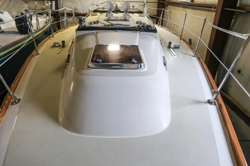 Slide: The Image of 2007 Sabre 386 sailboat deck view, showcasing sleek design and rigging details. - 9