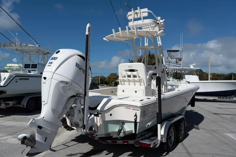 Slide: The Image of 2023 Pathfinder 2500 Hybrid boat with Yamaha V6 engine on trailer, sunny day. - 5