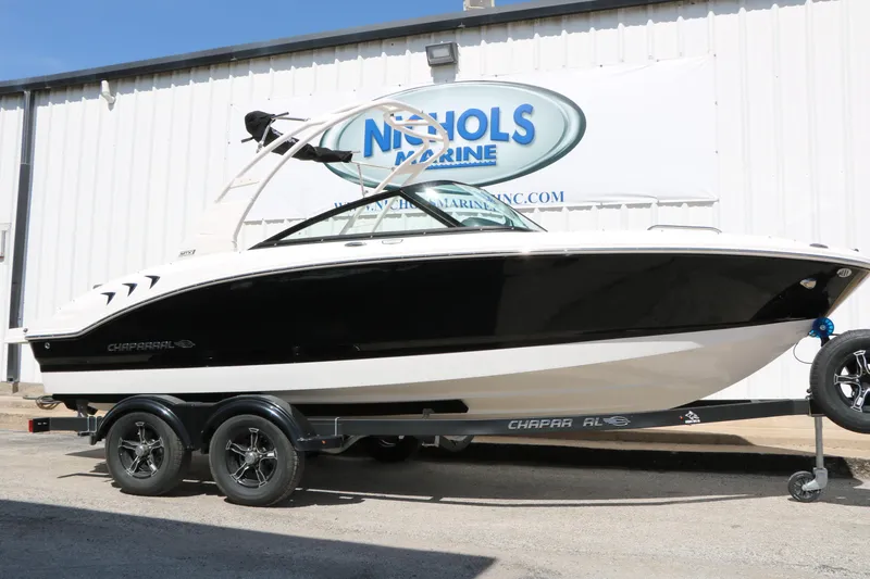 The Image of 2026 Chaparral 21 SSi boat on trailer outside Nichols Marine building. - 1
