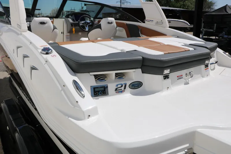 Slide: The Image of 2026 Chaparral 21 SSi boat with sleek design and luxurious seating. - 10