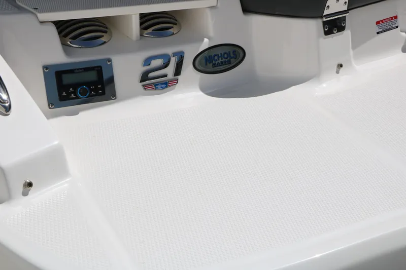 Slide: The Image of 2026 Chaparral 21 SSi boat deck with audio system and branding details. - 16