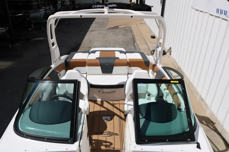 Slide: The Image of 2026 Chaparral 21 SSi boat interior with sleek seating and modern design. - 23