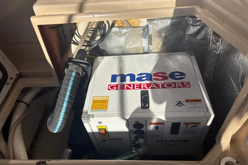 Slide: The Image of Mase generator installed in a 2012 Cutwater C-26 boat compartment. - 8